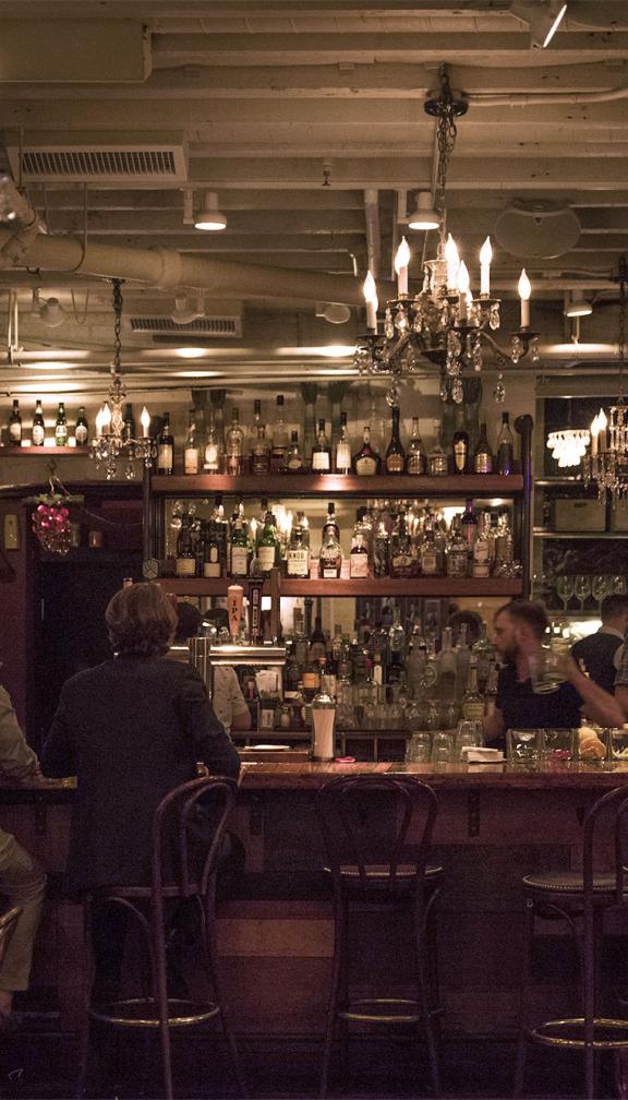 Customers enjoying their evening at Boston bar