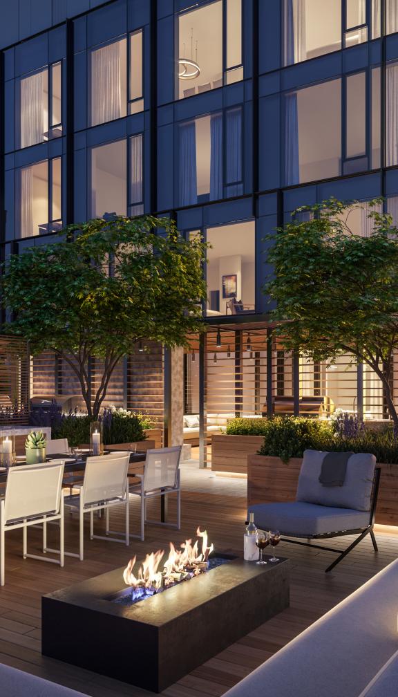 Stunning rooftop lounge with city skyline views of Boston at The Quinn